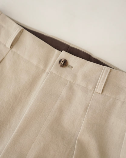 Cale-nidom chino two tuck trousers